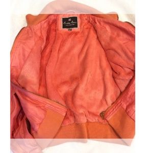London basic coral stretch Leather Jacket. With for lining and gold detail on th